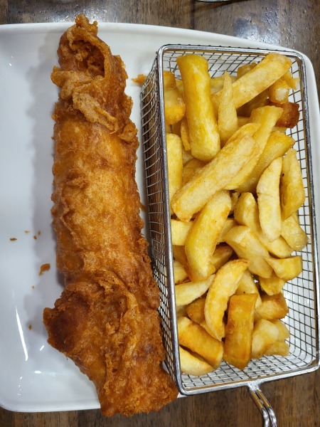 to think it isn't greedy to eat a whole fish, portion of chips and mushy peas with bread and butter?