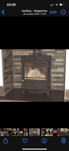What to do with these ugly bricks in fireplace?