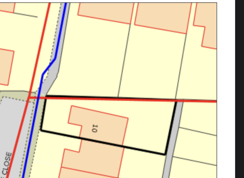 Public drain within property