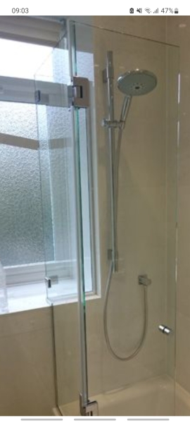 Bathroom - partially covering a window void for a shower - pictures?