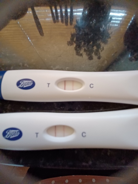 Test line darker than control line