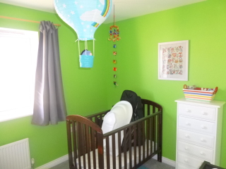 How do I style this awful green colour DS has picked for his room?