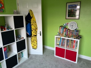 How do I style this awful green colour DS has picked for his room?