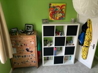 How do I style this awful green colour DS has picked for his room?