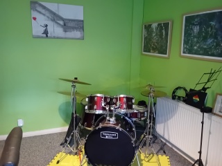 How do I style this awful green colour DS has picked for his room?