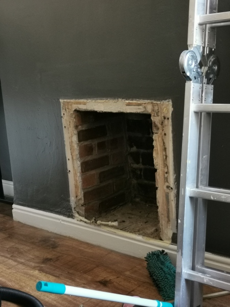 What do do with big hole where gas fire was?