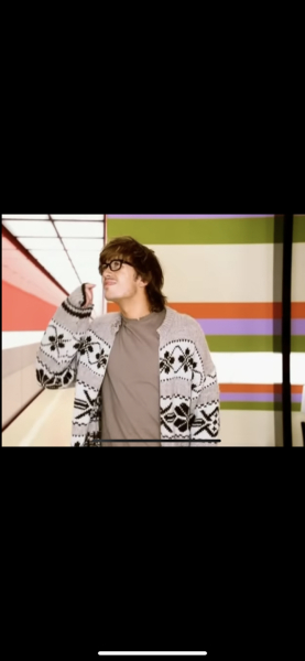 Attractive “nerd” in library music video