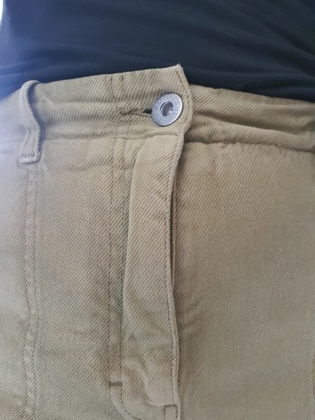 Why doesn't the fly cover on my trousers sit nicely?