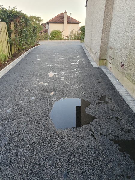 Puddles on New Tarmac Driveway