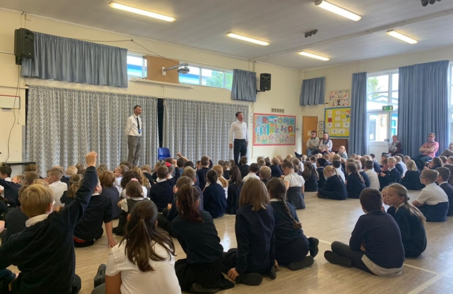 Being made to sit on the floor