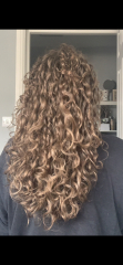 AIBU to not know how on earth to help DD with her frizzy hair?