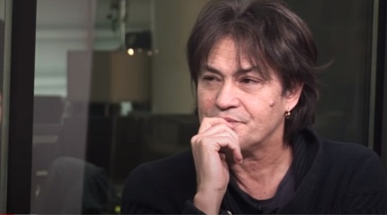 AIBU for having a crush on this elderly Croatian singer? Do you find him attractive?
