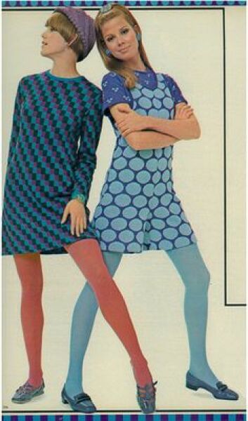 Standing pigeon-toed, looking at the ground while lightly touching your hair...