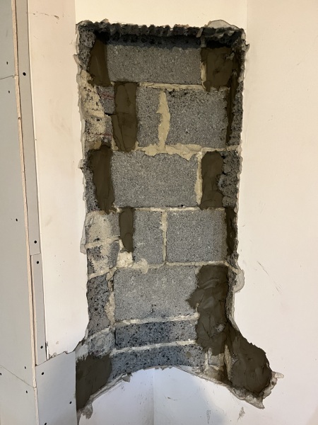 What to do about this ‘feature’ after wall removal?