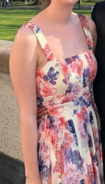 Is this dress too white for a wedding guest?