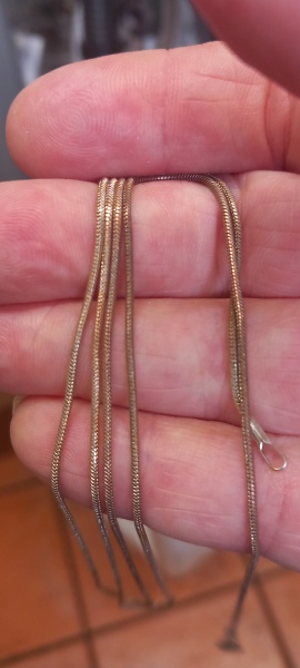 Can't clean this silver necklace, is it really silver?