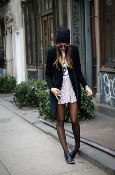 Standing pigeon-toed, looking at the ground while lightly touching your hair...