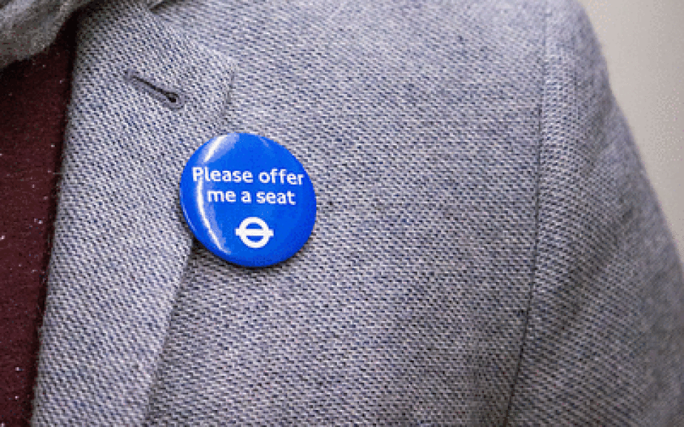 Giving up a bus seat for the elderly