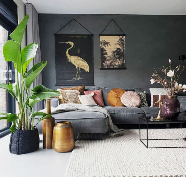 What can I do with grey sofa and carpet to make the room look warmer/cosier?