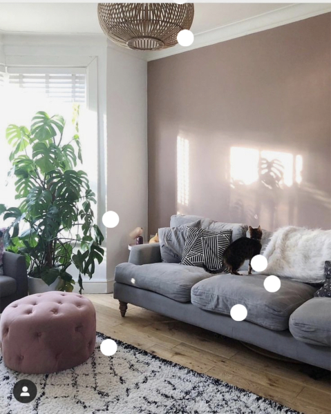 What can I do with grey sofa and carpet to make the room look warmer/cosier?