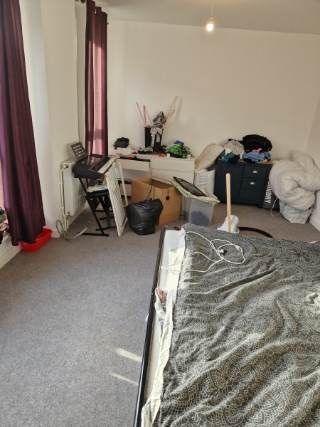 Bedrooms are trashed.  Finding it hard see pics