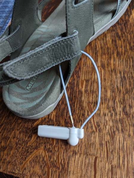 Security tag still on sandals