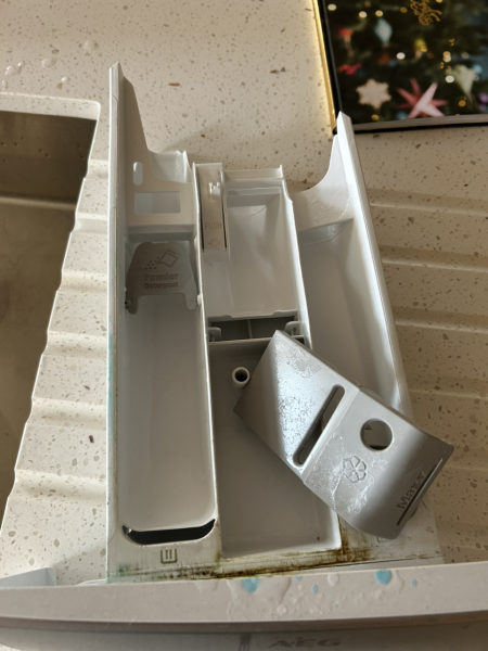 OMG I just pulled out my washing machine detergent drawer to clean it!