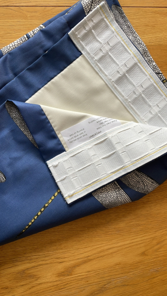 How do I pull up the strings on my brand new curtains??