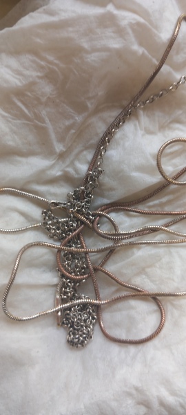 Can't clean this silver necklace, is it really silver?