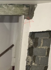 What to do about this ‘feature’ after wall removal?