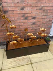 Help me track down this Copper colour water feature PLEASE?