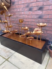 Help me track down this Copper colour water feature PLEASE?