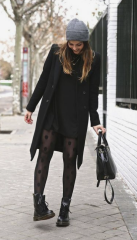 Standing pigeon-toed, looking at the ground while lightly touching your hair...