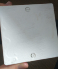 What is this white box which fell off wall, exposing a cable?