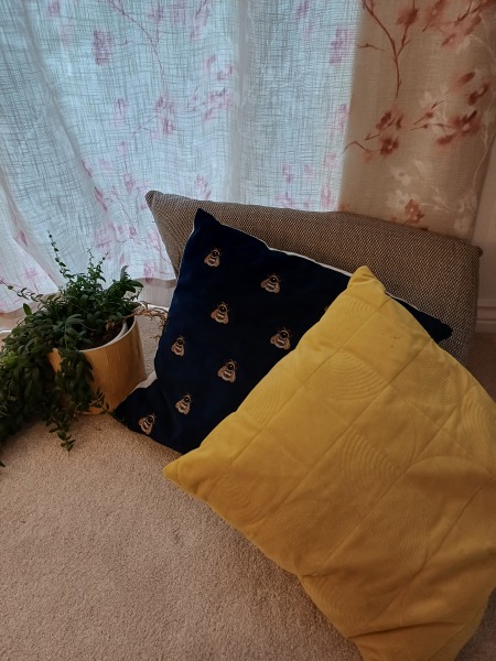 Toning down grey sofa