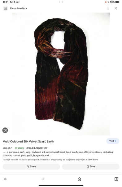 Help me find a scarf for this coat please