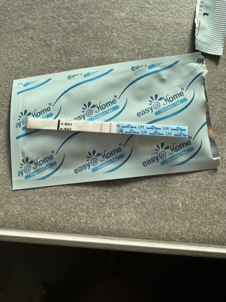 Is this positive for ovulation or can it go as dark for AF? Help!! Please