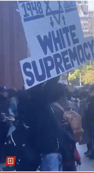Placards from antisemitic marches in London