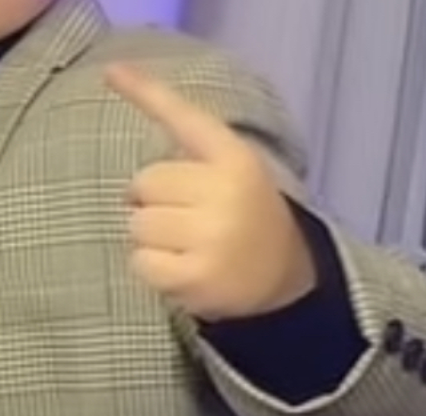 Does anyone know why teens keep making this gesture in photos?