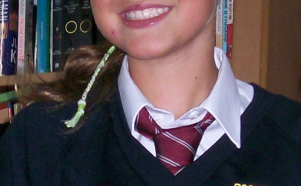 To tell MIL it's none of her business how DD looks on her school photo
