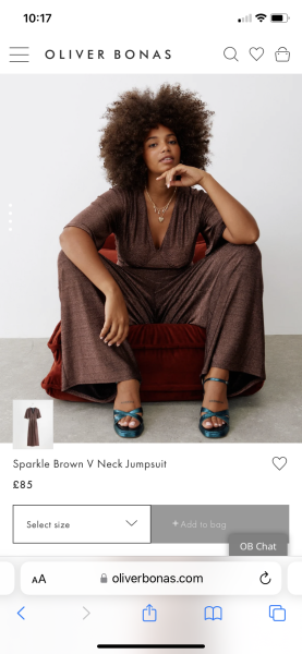Looking for a stylish long-sleeved jumpsuit for Christmas Day, possibly velvet, which shows off my curves while being family-friendly!