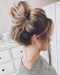 How to do a messy voluminous bun?