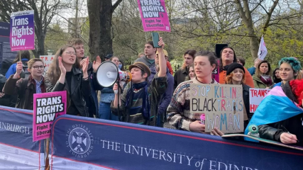 Glasgow Women's Library display signs from anti-feminist protest