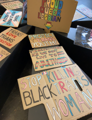 Glasgow Women's Library display signs from anti-feminist protest