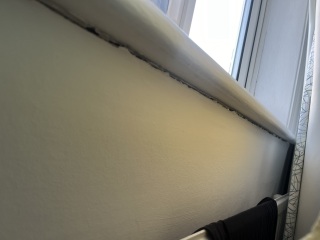 Cracks in wall and around window frame