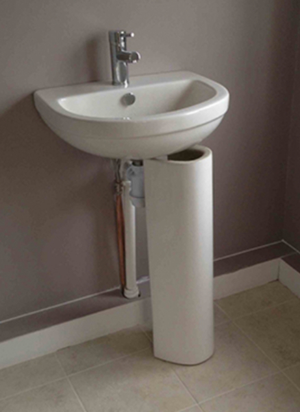 Easiest/cheapest way to hide these pipes? (photo)