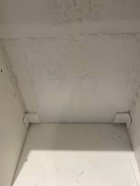 Black 'dust' in cupboards