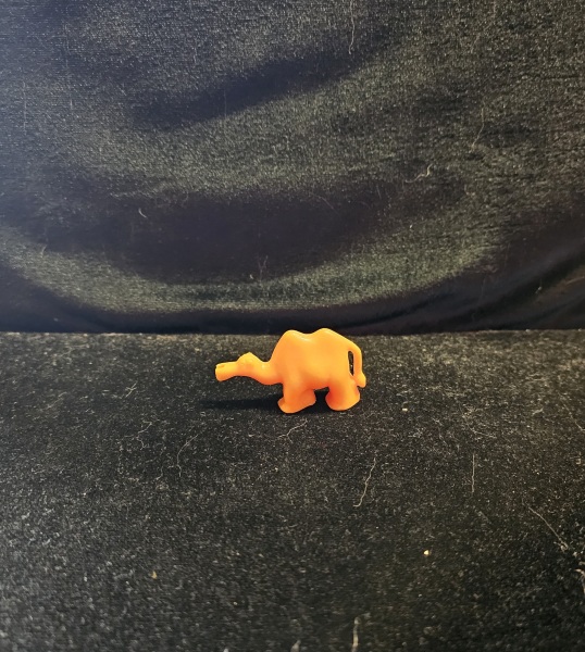 Is anyone here clever enough to put my camel in Santa's grotto? (Pic of my mascot included)