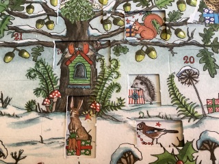 Picture advent calendars that add to the scene rather than have random pictures behind the doors