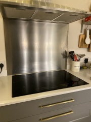 Brass handles and stainless steel tap?